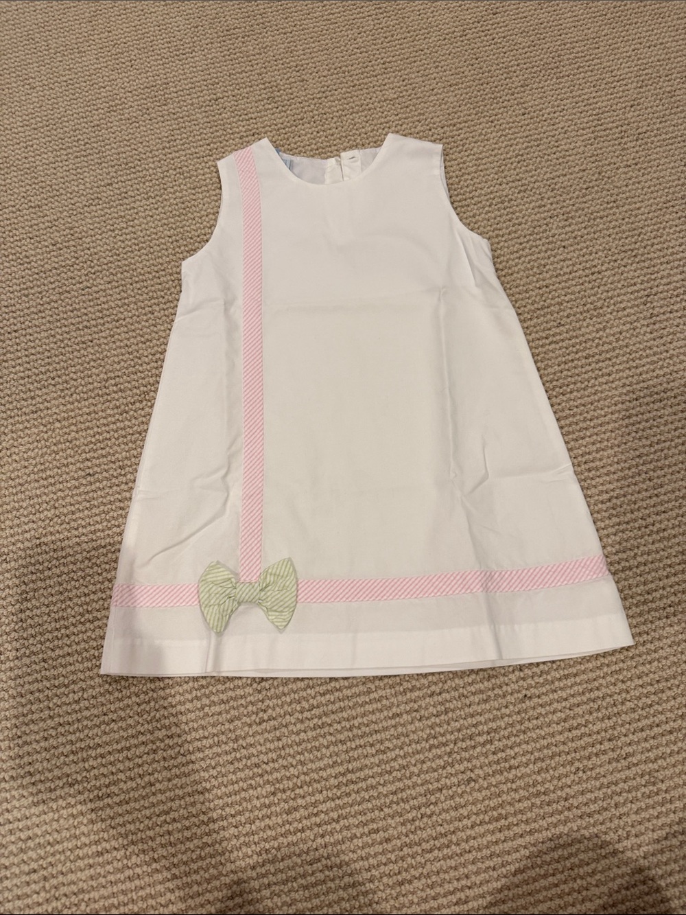 Little English White Dress with Pink Trim and Green Bow Accent